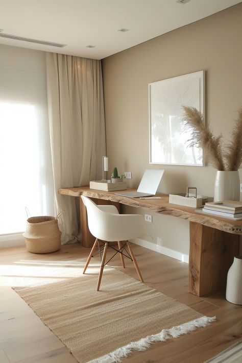 A minimalist home office focuses on simplicity and function, removing unnecessary clutter. Click for more ideas. Home Office Organic Modern, Natural Desk Setup, Neutral Boho Office, Modern Organic Office, Organic Modern Office, Minimalist Home Office Ideas, Neutral Office Decor, Home Office Neutral, Home Office Minimal