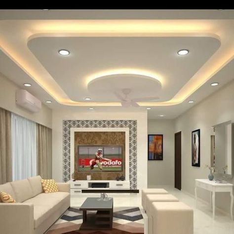 Latest Modern Living Room False Ceiling Design Ideas 2023 | POP False Ceiling Design Is your living room looking a bit dated? Check out these latest Modern Living Room False Ceiling Design Ideas 2023 | POP False Ceiling Design ideas to refresh your space! From bold to subtle, these designs will create a striking impact on your home. Whether you're looking for a dramatic change or something more subtle, these designs will have you looking forward to sitting down in your living room again! Best False Ceiling Designs, Latest False Ceiling Designs, Pop Design For Hall, Simple False Ceiling Design, Bedroom Pop Design, Simple Ceiling Design, Plafon Gypsum, False Ceiling Bedroom, Pvc Ceiling Design