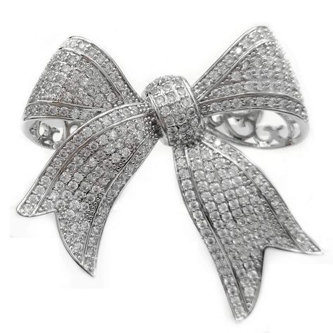 PRICES MAY VARY. Introducing these stunning full micro pave tiny clear CZ bowtie brooches, crafted in a sleek silver tone. Each piece boasts a delicate ribbon bow knot design, imbuing a timeless classic and antique charm. Perfect for adding a touch of bling to your outfit, these bowknot pins are the ideal accessory for your coat or any garment that deserves a touch of elegance. The intricate micro pave setting showcases the sparkling clarity of the CZ stones, ensuring that you'll shine wherever Types Of Coats, Crystal Snowflakes, Bow Brooch, Bee Cards, Victorian Vintage, Knot Design, Vintage Ribbon, Heart Shaped Rings, Silver Bow