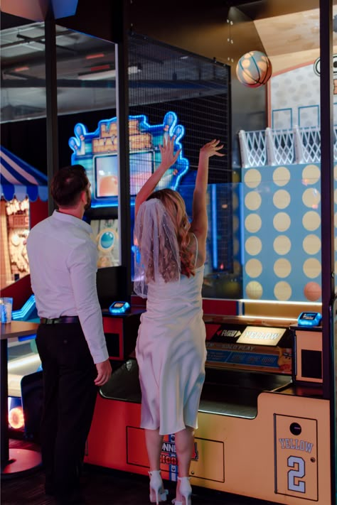 I had so much fun running around the arcade with these newlyweds! These San Diego fun wedding portraits are perfect Inso for outgoing couples. Get inspired by arcade couple photoshoot, arcade couple pictures, fun outgoing wedding photos, unique wedding photos, unique couple pictures, San Diego wedding photographer, Oceanside Ca photographer, Arcade engagement photos. Book Valerie as your family photographer at https://valeriepenaphotography.mypixieset.com/contact/ Board Game Couple Photoshoot, Arcade Prenup Shoot, Arcade Prom Pictures, Neon Engagement Photos, Gaming Engagement Photos, Bowling Alley Photoshoot Couples, Arcade Wedding Reception, Gamer Engagement Photos, Unique Couple Photoshoot Ideas