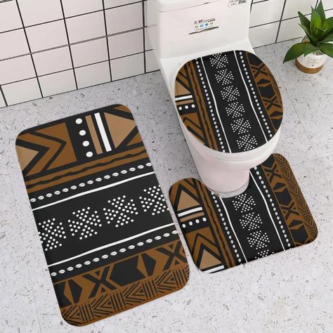 Watch the YouTube review for more detail:  https://youtu.be/3slACe52nIE Beautiful African bogolan mud cloth design 3-piece bathroom toilet set. This set comes with a floor mat for outside your tub or shower, a floor mat for your toilet and a toilet seat cover. Give your bathroom a stylish look with this gorgeous set. Made of polyester foam material for comfort and durability. The material has a foam-like consistency. Look in the shop for a matching shower curtain to complete your bathroom decor. * NOTE: The toilet seat cover is designed to fit an oval shaped toilet cover and may not properly fit a more round seat cover. Please measure your toilet seat cover to be certain. Bathroom Wishlist, Afrocentric Decor, Print Business, Ethnic Home Decor, African Accessories, African Home Decor, Cloth Design, African Decor, African Mud Cloth