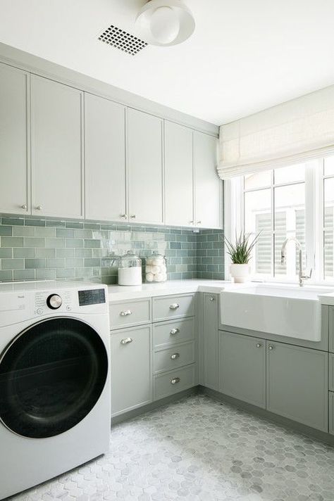 Beautiful green backsplash tile and hexagonal tile floors in a laundry room space Hexagon Laundry Room Floor, Laundry Room Wall Tile, Hexagon Tile Laundry Room, Green Backsplash Tile, Hexagon Flooring, Mudroom Tile, Laundry Room Floor, Laundry Remodel, Brooke Wagner Design