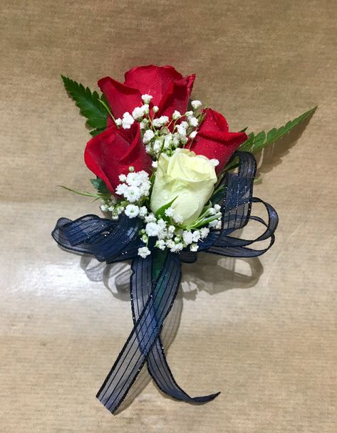 Pin-on corsage. Red and white roses, baby breath, leather leaf fern, navy ribbon Red And Blue Corsage, Red White And Blue Corsage, Red White And Blue Boutonniere, Leather Leaf Fern, Red Corsages, Prom Flowers Corsage, Blue Corsage, White Corsage, Blue Boutonniere