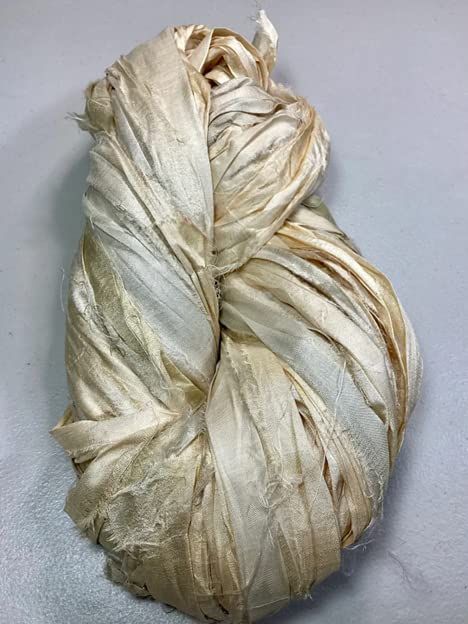 PRICES MAY VARY. Recycled sari silk ribbon yarn 100% silk yarn Real 100% pure silk ribbon, Ribbon is sewn end to end to make a continuous ribbon, frayed and can be tangled because of hand made nature. Multicolored sari silk ribbon yarn Amount: 50-60 yards / 100 grams hank Content: 100% Silk Weight: Bulky Amount: 50-60 yards / 100 grams hank Care: Hand Wash and Dry Flat This yarn is made of pure silk and is approximately an inch wide throughout. Due to its handmade nature there might occasionally Recycled Product, Sari Silk Ribbon, Neck Warmers, Stag Beetle, Recycled Sari Silk, Ribbon Yarn, Punch Needle Embroidery, Vintage Junk Journal, Silk Ribbon Embroidery