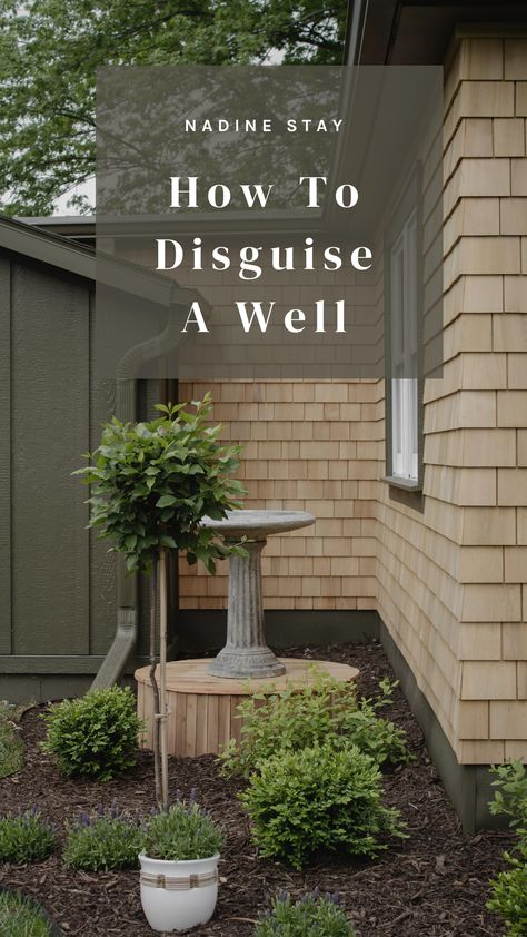 How to build a well cover for an unused well. How to hide a well. How to make a round well cover with cedar fence wood and cedar slats. Outdoor DIY project. Well cover build diy and tutorial by Nadine Stay. Landscaping ideas and plants. Cedar shingle siding with brown mulch landscaping. Lilac tree & bird bath. Exterior design by Nadine Stay. | #wellcover #well #cedarshingles #cedarshakes #landscaping #englishgarden #birdbath #cedarwood How To Hide Well In Yard, Well Covering Ideas Outdoor, Wellhead Cover Ideas, Decorative Well Pump Covers, Well Cover Ideas Outdoor Diy, Hide Well Pump In Yard, Well Pump Cover Ideas Front Yards, Brown Mulch Landscaping, Well House Cover Ideas