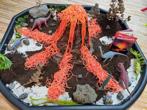 Volcano Sensory Bin, Dragon Sensory Play, Volcano Sensory Play, Environment Sensory Bin, Volcano Montessori, Fake Dirt Sensory Bin, Themed Activities, Sensory Bin, Sensory Bins