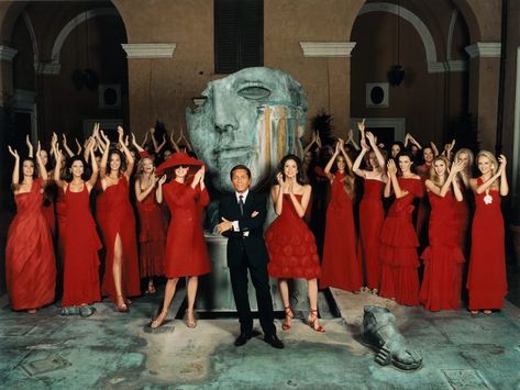 Valentino Garavani in Rome with his models, circa 1999. Photo: Pascal Chevallier / Gamma-Rapho via Getty Images “Valentino, live 100 years!” declared Jacqueline Kennedy in 1966. It’s a sentiment we’d like to repeat today as the designer celebrates his 90th year—in great style, of course. Valentino Garavani has the rare distinction of having his own Pantone color, Valentino Red, and in lieu of a toast we’ve collected a host of elegant looks in his namesake color. “When you see a woman in a b Joy Bryant, Minnie Driver, Nadja Auermann, Jacques Fath, Natalie Imbruglia, Olga Kurylenko, Elle Macpherson, Natalia Vodianova, Rei Kawakubo