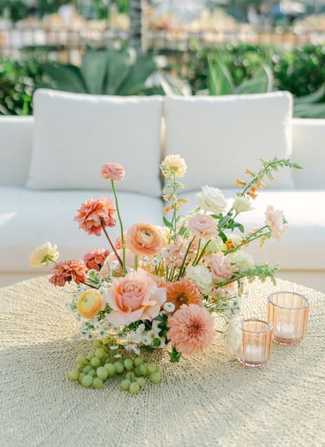 🎾 Love served up on the wedding court! We are obsessed with Grace and Max's whimsical wedding.  Photography: @dianesoterophoto Planning: @amorology Rentals: @bbjlatavola @adorefolkflore @brighteventrentals @theonicollection  Entertainment: @benmallareentertainment  #nativepoppyweddings #nativepoppy  #weddinginspo #tenniswedding #wimsicalweddings #sandiegoweddingflorist #sandiegoflorist #weddingflorals #weddingflowers Ground Wedding Florals, Dahlia Wedding Florals, Orange And Pink Fall Wedding Colors, Apricot Rose Wedding, Spring Floral Arrangements Wedding, Whimsical Flowers Wedding, August Wedding Decor, Pedestal Floral Arrangements, Green Peach Wedding