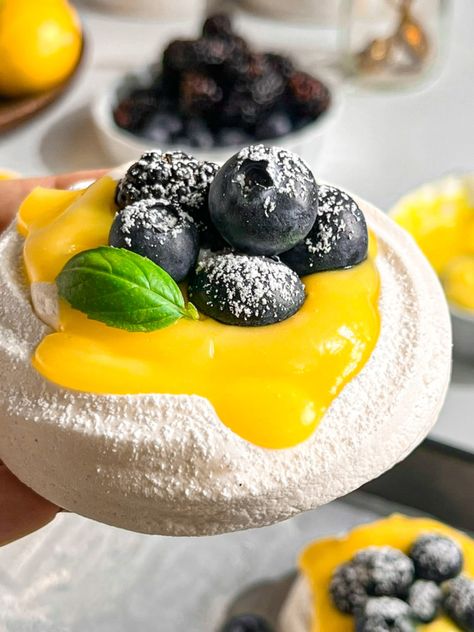 Blueberry Lemon Curd Pavlova - PastrybySaloni What Is Pavlova, Lemon Pavlova, Blueberry Lemon Curd, Lemon Curd Pavlova, Blondie Cake, Dessert Loaf, Baking Conversion Chart, Easy Lemon Curd, Baking Conversions