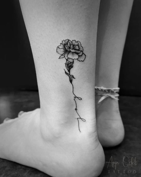 Joy. Taking a memory of our country back to USA. . Tattooed by me. . #carnation #carnationtattoo #legtattoo #linework #flowertattoo… Carnation Geometric Tattoo, Name Flower Tattoo, Carnation Flower Tattoo, Marigold Tattoo, Carnation Tattoo, Birth Flower Tattoos, Memorial Tattoos, Dainty Tattoos, Favorite Flower