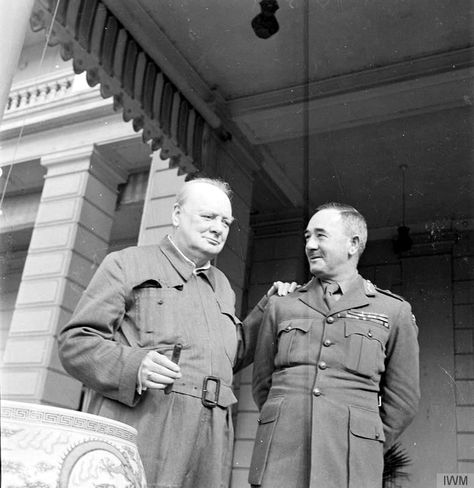 Winston Churchill stands with his hand on a British officer's shoulder while smoking a cigar at the British Embassy in Cairo in August 1942. Dwight Eisenhower, British Prime Ministers, Military Uniforms, Photo Banner, American Presidents, Poster Pictures, Winston Churchill, Great Leaders, Churchill