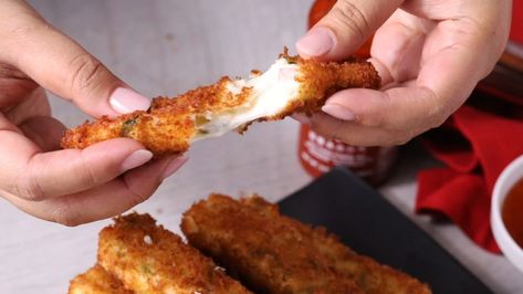 Crab Rangoon Mozzarella Sticks | Better Homes & Gardens Mozzarella Stick, Chinese Appetizers, Crab Rangoon Dip, Food On Sticks, Crab Rangoon, Meat Snacks, Mozzarella Sticks, Cheese Sticks, Sweet Chili Sauce