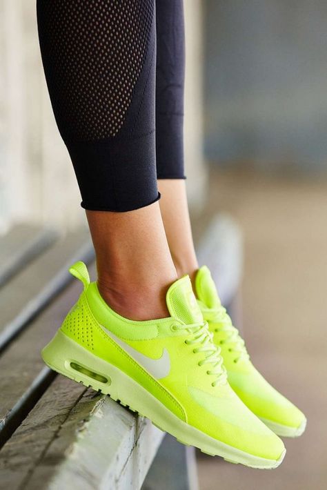 Amp up a pair of boyfriend jeans with these ultra bright lime green sneakers. Neon Nike Shoes, Bright Sneakers, Neon Sneakers, Neon Shoes, Estilo Fitness, Nike Neon, Colorful Sneakers, Nike Air Max Thea, Shoes Sneakers Nike