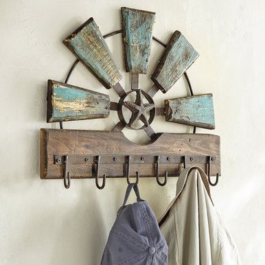 Exclusive Item - Hang your coats and hats in western style with this rack featuring a windmill design and lone star accent. Wood and metal construction with a weathered turquoise finish. Six hooks. 20"W x 3"D x 16"H. Painted Ironing Board, Liquor Bouquet, Wooden Windmill, Windmill Wall Decor, Metal Coat Rack, Ranch Ideas, Windmill Decor, Tree Coat Rack, Rustic Coat Rack