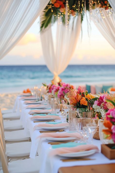 Transform your beach wedding into a tropical paradise with stunning floral designs! Our unique bridal ideas will elevate your special day and create unforgettable memories for you and your guests. Explore more now!    #TropicalWeddings #BeachWedding #FloralDesigns #WeddingInspiration #BridalIdeas #WeddingPlanning #DestinationWedding #TropicalBride #WeddingDecor #FloralArrangements #RusticWedding #BohoWedding #WeddingTrends #WeddingFlowers #SayIDo Simple Tropical Wedding Table Decor, Tropical Table Setting Wedding, Tropical Wedding Table Decor, Tropical Wedding Ceremony, Tropical Boho Wedding, Tropical Wedding Reception, Elegant Floral Arrangements, Tropical Wedding Theme, Tropical Beach Wedding