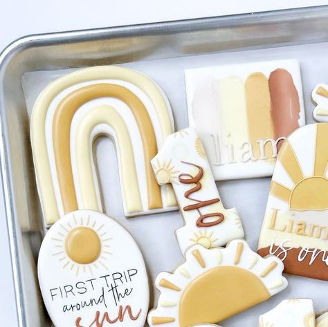 Emily Austin | Sugar Cookie Artist on Instagram: "First trip around the sun ☀️   Cookie inspo: @riverandbirchcookies  . . . . #customsugarcookies #bakersofinstagram #cookieartist #cookiedecorating #franklinindiana #smallbusiness #sugarcookiemarketing #firstbirthday #birthdaycookies #firsttriparoundthesun" Sunshine Cookies Decorated, Trip Around The Sun Cookies, First Trip Around The Sun Cookies, Sun Cookies, Sunshine Cookies, First Trip Around The Sun, Birthday Cookies, Baby First Birthday, Artist On Instagram