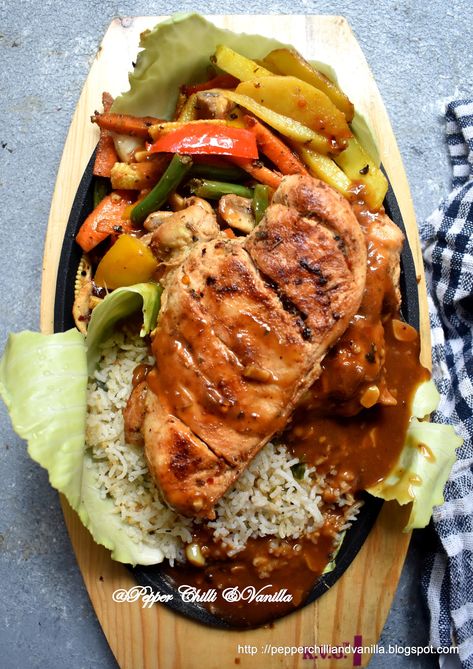 Grilled Chicken Sizzler Recipe Chicken Steak Recipe Grilled, Sizzlers Recipes, Sizzler Steak Recipes, Chicken Steak Plating, Sizzler Recipes Vegetarian, Chicken 555 Recipe, Chicken Sizzler Recipe, Chicken Continental, Chicken Sizzler