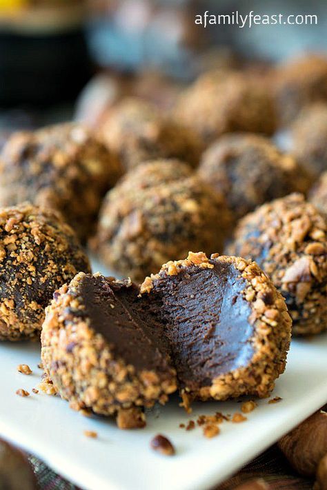 Hazelnut Truffles - Sinfully good but easy to make!  These are so good they should be illegal! Hazelnut Truffles, Dessert Truffles, Candy Truffles, Truffle Recipe, Family Feast, Cake Truffles, Homemade Candies, Candy Desserts, Chocolate Truffles