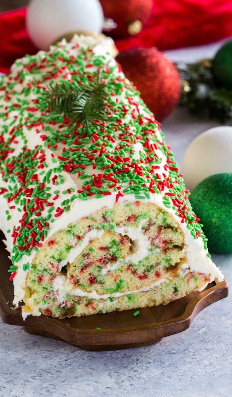 Funfetti Christmas Cake Roll Recipe - Passion For Savings Cake Roll Recipes Christmas, Funfetti Christmas, Christmas Cake Roll, Festive Dessert Recipes, Holiday Desserts Christmas, Cake Roll Recipes, Holiday Dessert Recipes, Festive Desserts, Funfetti Cake