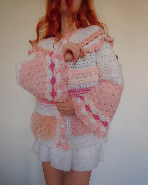 🌸pink, girly, cozy🌸 This handmade crochet cardigan showcases a beautiful blend of soft pink, white, and cream hues, adorned with intricate details like puffy sleeves, braided accents, and delicate buttons. Its girly design makes it a perfect match for both casual and romantic looks. Available now in M/L size, with the option to customize colors and sizes to fit your style. The ideal cozy layer for in-between seasons!🫶🌷🎀 💘Handmade 💘Ready to ship in M/L size 💘Custom colors and sizes available ... Crochet Cardigans, Girly Design, Romantic Look, Puffy Sleeves, Crochet Cardigan, Intricate Details, Handmade Crochet, Perfect Match, Soft Pink