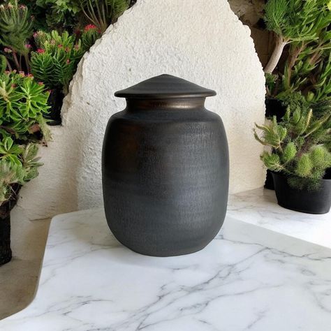 This is a beautiful handmade small/medium sized porcelain urn.  I have hand crafted this piece on my potter's wheel from soft porcelain clay and fired it in reduction to over 2,400 degrees fahrenheit.  The capacity of this small/medium sized urn is 75 cubic inches with overall dimensions of 7.25" tall x 5.25" wide.  Please message me if I can answer any further questions. Amarillo Tx, Pottery Clay, Porcelain Clay, Potters Wheel, Style Expert, Clay Pottery, Handmade Pottery, Cemetery, Hand Crafted