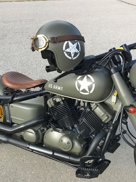 Army military theme bobber. WWII OD green bike and helmet. Halcyon, brass and real leather goggles.  @classicparts #vstarbobber650  #vstarbobber  #vstar650 #vstar  #SouthernPolyurethanes #bluecollarbobbers #kuryakyn Green Motorcycle Helmet, V Star Bobber, Army Motorcycle, Motos Bobber, Bobber Motorcycles, Harley Davidson Scrambler, Green Motorcycle, Military Motorcycle, Green Bike