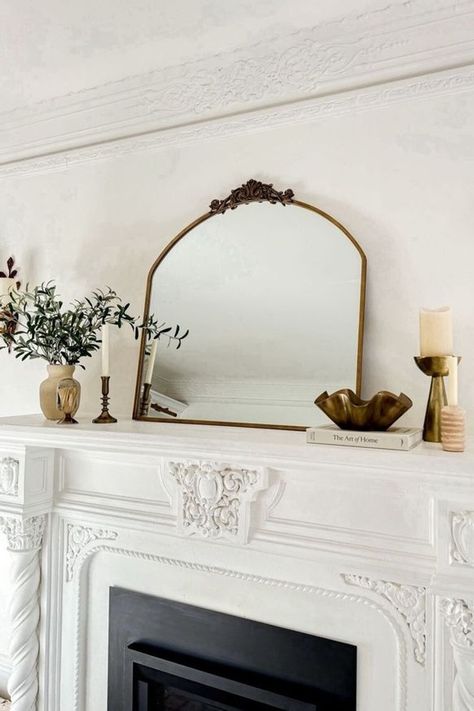 Want to change up your home décor for the spring? Honest Darling is sharing how she decorated her fireplace mantle for Spring. This mantle décor is chic and cozy perfect for any living room space. Follow for more home décor ideas, decorating shopping guides, and style tips. (I make commissions for purchases made through the link in this pin) Mirror Fireplace Mantle, Above Fireplace Decor, Decorate Your Fireplace, Spring Mantle, Mantel Mirrors, Fireplace Mantel Decor, Fireplace Mirror, Home Decor Idea, Spanish Style Home