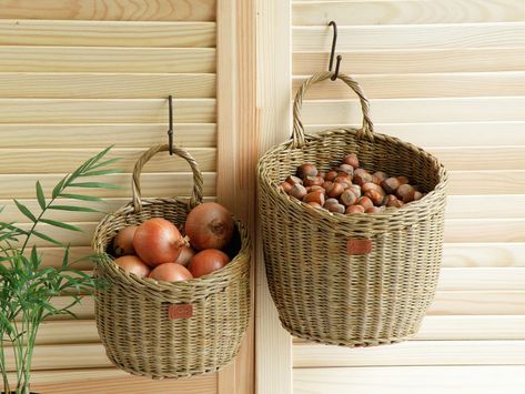 "These hanging wicker wall brown baskets with handle are very decorative and natural looking. Hanging baskets are made from paper wicker. This is a natural environmentally friendly material. A great choice to give your home a rustic feel. You can store small fruits and vegetables, garlic, nuts or store kitchen utensils such as cutlery and ladles. These baskets are also good as plant stands. You can put other materials according to your needs. These are multifunctional baskets. Please pay attenti Wire Basket Decor Ideas, Potato Onion Bin, Potato And Onion Bin, Hanging Kitchen Utensils, Hanging Wicker Baskets, Potato Basket, Paper Wicker, Potato Storage, Brown Baskets