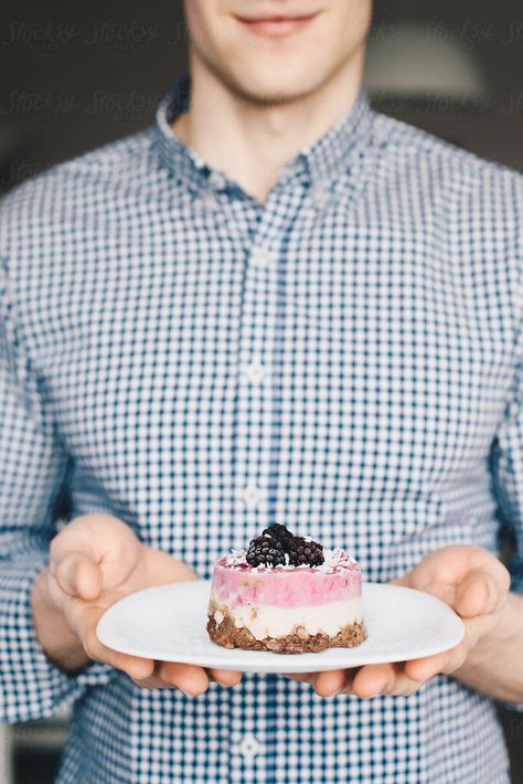 Crop young man in checkered shirt holding plate with delicious small raw cake. Holding Cake Pose Reference, Holding Plate Reference, Holding Cake Pose, Food Stock, Raw Cake, Male Pose Reference, Backgrounds Phone, Pose References, Checkered Shirt