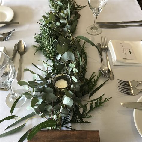 Foliage runner of mixed leaves and eucalyptus / gum for wedding reception Gum Leaves Wedding Table, Wedding Table Garland, Table Garland, Seeded Eucalyptus, Winter Wedding Decorations, Eucalyptus Wedding, Wedding Leaves, Cheap Wedding, Leaf Table