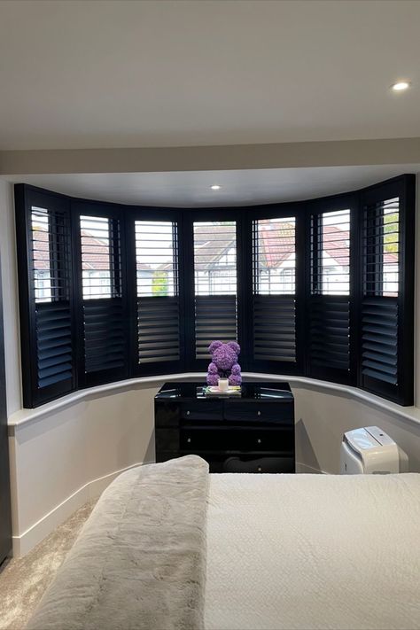 Create something a little different for your bedroom with bold statement black wooden shutters. Bedroom Shutters, Window Styling, Bay Window Shutters, Bedroom Bay Window, Grey Interiors, Wooden Shutters, Black Bedroom, Window Shutters, Window Styles