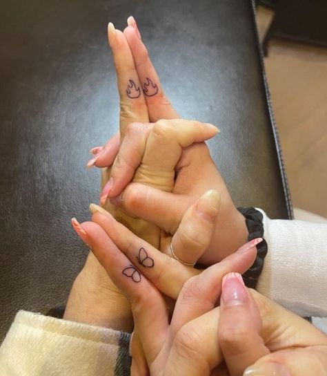 Twin Finger Tattoos, Tattoos For Him About Her, Simple Twin Tattoos, Sister Matching Finger Tattoos, Small Tattoos For Twins, Twin Flame Finger Tattoo, Twin Flames Tattoo Ideas, Small Spontaneous Tattoos, Matching Taurus Tattoos