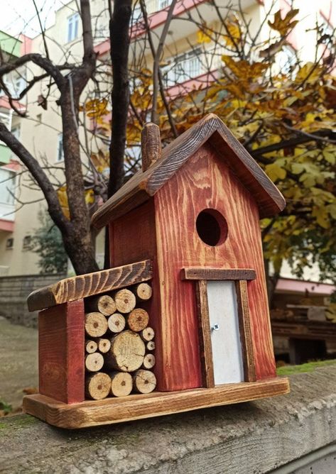 Winter Birdhouse made from pine wood in my small workshop, i hope you will enjoy it, width 26cm, height 25cm, depth 15cm inside the nest: 9*9cm  Inlet diameter: 4 cm All of our products are coated with Yacht Varnish and are water resistant. It is robust and long lasting. There is a small door from back of the nest in order to clean inside of the nest,  All of our bird houses are carefully and uniquely styled and made by hand. There may be slight variations in paint and wood thickness. Boat Birdhouse, Winter Birdhouse, Diy Bird House, Cool Bird Houses, Diy Woodworking Ideas, Intarsia Wood Patterns, Hand Painted Birdhouses, Bird Houses Ideas Diy, Birdhouses Rustic