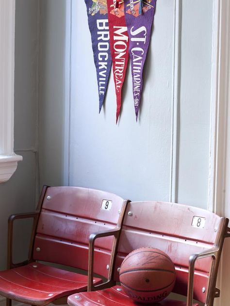 Retro Gym Interior, Barstool Sports Aesthetic, Boys Vintage Sports Room, Vintage Gymnasium, Boy Nursery Vintage Sports, Mixed Dining Chairs, Vintage Sports Pennants, Bay Window Living Room, Retro Gym