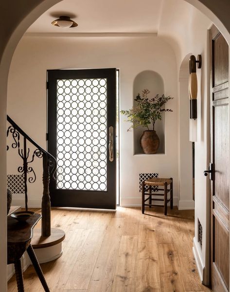 This Art Director Stumbled Across His L.A. Home on a Stroll Magical Interior, Spanish Bungalow, Reclaimed Doors, New Paint Colors, Vintage Credenza, Spanish Style Home, Vintage Dining Chairs, Spanish House, Wood Ceilings