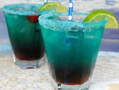 Shark Bite Drink Recipe: A Stunning Visual Guide - RecipeStrip Shark Bite Drink, Shark Bite Drink Recipe, Summer Beverages, Lime Tart, Beach Cocktails, Malibu Rum, Slice Of Lime, Summertime Drinks, Blue Food Coloring