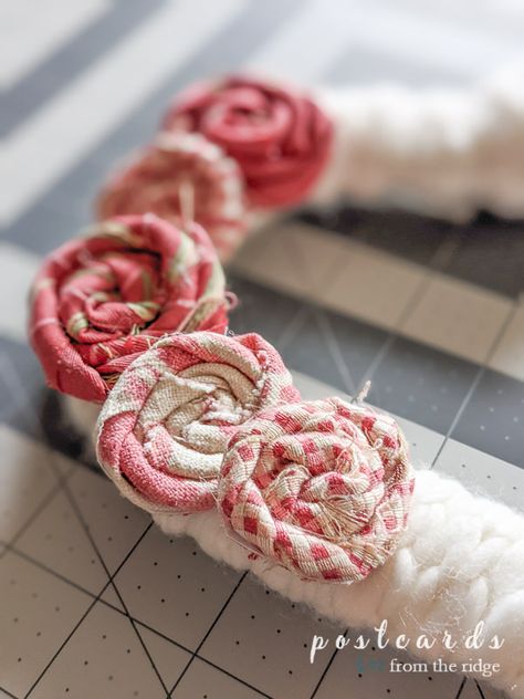 DIY Fabric Flower Wreath Rolled Fabric Flowers Diy, Spring Fabric Wreath Diy, Fabric Wrapped Wreath, Shabby Chic Crafts Diy Fabric Scraps, Leather Wreath Diy, Diy Fabric Wreaths For Front Door, Chunky Yarn Heart Wreath, Fabric Heart Garland, Cloth Wreaths Fabric Scraps