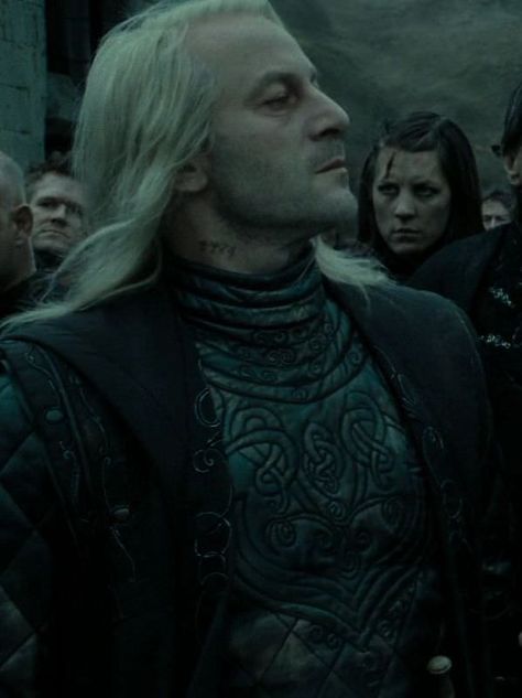 In Harry Potter and the Deathly Hallows: Part 2, Lucius Malfoy has a tattoo of his Azkaban number on his neck. Malfoy Tattoo, Lucius Malfoy Cosplay, Lucius And Narcissa, Lucious Malfoy, Narcissa Malfoy, Harry Potter Wiki, Malfoy Family, Jason Isaacs, Lucius Malfoy