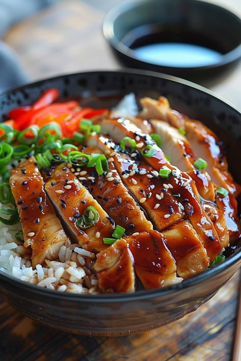 Teriyaki chicken rice bowl topped with sliced green onions and sesame seeds, with soy sauce in the background. Teriyaki Chicken Bowls, Teriyaki Chicken Bowl Recipe, Healthy Teriyaki Chicken, Chicken Board, Teriyaki Chicken Bowl, Teriyaki Chicken Stir Fry, Easy Teriyaki Chicken, Chicken Bowl Recipe, Chicken Fresh