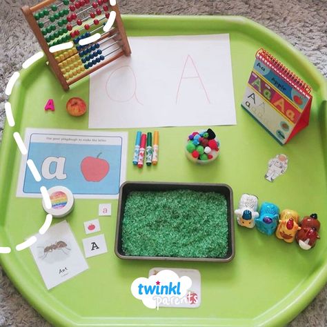 We love this letter A tuff tray- so many different activity ideas to become familiar with the first letter of the alphabet. Thank you @all.about.the.play (on instagram) for sharing this great photo- so many ideas to make learning fun.   They made the letter A in a tray of rice, made the letter A from playdough and created an A shape using pom poms. Alphabet Tuff Tray Ideas, Letter Tuff Tray Ideas, Dough Mats, Class Activity, Eyfs Activities, Initial Sounds, Letter Tray, The Letter A, Classroom Organisation