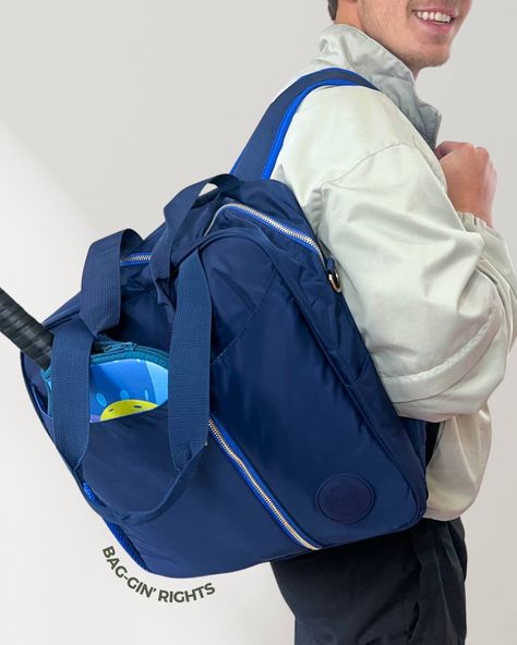 3 reasons why our 3-in-1 bag is designed with you in mind: -Convertible design allows for seamless transformation from a backpack, to a crossbody to a tote. Wear what works best for you! -Exterior pocket fits up to (2) paddles with plenty of interior storage pockets and a removable shoe bag. 🏓 -Interior includes an insulated cooler pocket to keep snacks and beverages cool while you play. ❄️ Tap on our profile to shop #PoshPickler 🌟 . . . . #PickleballGear #pickleballislife #pickleballpadd... Carryon Bag, Small Business Saturday, Pickleball Paddles, Paddles, 3 In 1, Travel Essentials, Gym Bag, Fun Sports, Convertible