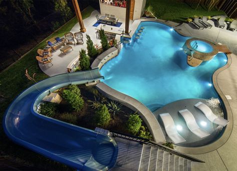 Swimming pool with a slide idea for the backyard. | 11 of the Best Backyard Swimming Pools We've Ever Seen Swimming Pool Slides, Big Swimming Pools, Dream Backyard Pool, Big Pools, Big Backyard, Swim Up Bar, Splash Pool, Dream Pools, Custom Pools