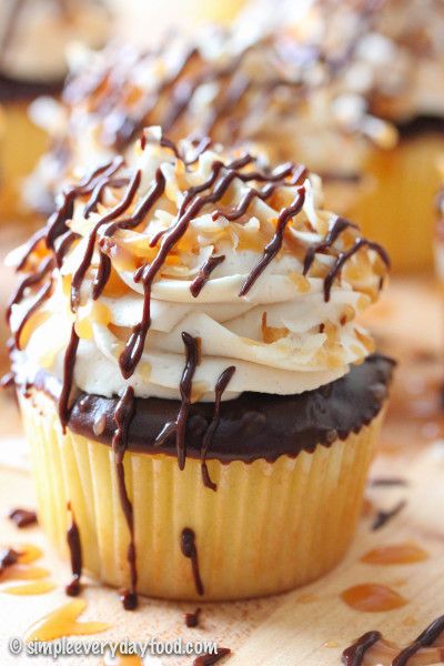 Samoa Cupcakes with Caramel Buttercream Frosting | recipe from Simple Everyday Food Samoa Cupcakes, Cupcakes With Caramel, Caramel Buttercream Frosting, Cookies Cupcake, Caramel Buttercream, Dessert Cupcakes, Yummy Cupcakes, Chocolate Cupcakes, Buttercream Frosting