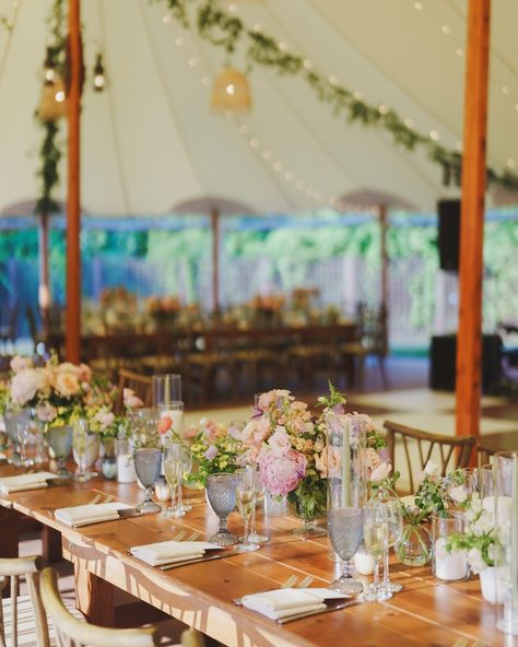 A white wildflower garden ceremony transitioned to a more colorful reception tablescape design with farm tables Willow Chairs and our Dusty Blue Water Goblets providing ‘something blue’ for the reception. Our new Mahogany and White Checkered Dancefloor paired perfectly with our Sperry Tent canopy decorated with bistro lights, greenery, and rattan lampshades. We created a 100% gluten-free menu for Sarah and Austin! Willowdale Estate has catered several gluten-free weddings, and it was great ... Blue Goblets Wedding, Checkered Dancefloor, Goblets Wedding, Blue Water Goblets, Colorful Reception, Gluten Free Wedding, Blue Goblets, Tablescape Design, Willowdale Estate