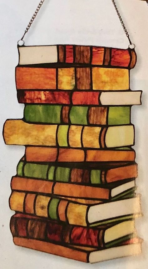 Lovely stained glass books. Perfect for a library window! Stained Glass Stack Of Books, Fun Stained Glass Ideas, Stained Glass Books, Simple Stained Glass Patterns Free Printable Templates, Stained Glass Patterns Free Printables, Stainglass Ideas, Books Stacked, L'art Du Vitrail, Glass Book