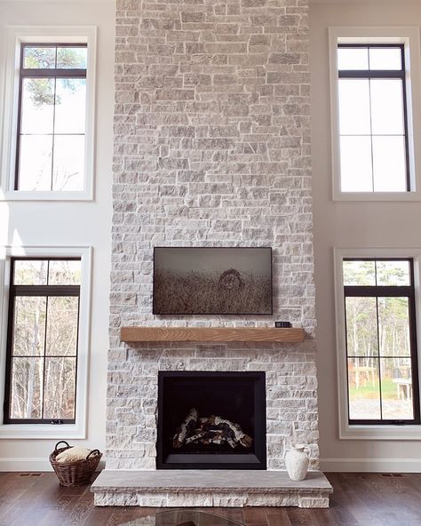 Bowers Construction Halifax on Instagram: “Fresh, classy, and a little bad ass-y.  Every time we see this #GoingAllTheWeybridge ultra-custom stone fireplace surround, we feel all…” House Decoration For Wedding, Shiplap Tile, Flip This House, Fish Tank House, Tile Fireplaces, White Stone Fireplaces, Tank House, Cottage Fireplace, Stone Fireplace Surround