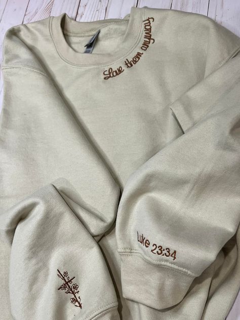 I was so excited when my customer Michelle brought me her ideas for two new crewnecks she wanted me to embroider for her. She searched her Bible for the perfect scriptures and I think she chose so well. I just loved bringing her ideas to life in these two shirts for her! https://villageembroideryllc.etsy.com Crewneck Diy, Love Them Anyway, Crewneck Embroidery, Christian Clothing Brand, Gospel Quotes, Christian Hoodies, Flower Sweatshirt, Floral Cross, Christian Sweatshirt