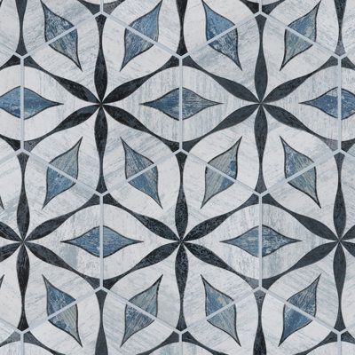 Inspired by a vintage look, our Cassis Hex Flower Black Porcelain Floor and Wall Tile features a mixed textured finish, making it a great choice for your space. With its impervious, frost-resistant features, this blue hexagon tile is ideal for indoor and outdoor commercial and residential installations, including kitchens, bathrooms, backsplashes, showers, hallways, entryways, patios, and fireplace facades. This tile is a perfect choice on its own or paired with other Cassis Hex Flower Collectio Fun Tile For Laundry Room, Blue Glass Bathroom Tile, Blue Flower Tile Bathroom, Merola Tile Backsplash, Blue Bathroom Flooring, White Cabinet Blue Backsplash, Fun Mudroom Tile, Blue Tile In Bathroom, Pretty Backsplash Kitchen