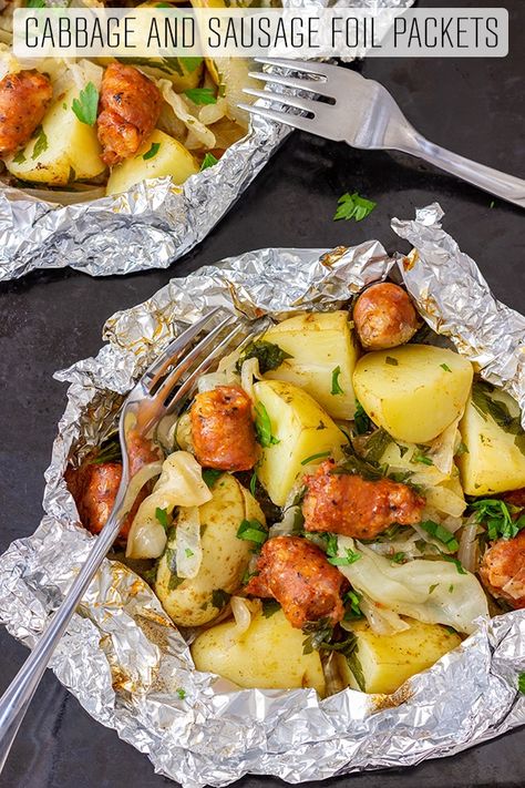 A simple recipe for cabbage and sausage foil packets. Cooked in packets in the oven! Also perfect for outdoor entertaining so if you are planning on grilling or camping this is an easy recipe to make! #cabbage #sausage #foilpackets #recipe #outdoorcooking #cooking #meal #lunch #dinner #camping #barbecue #grilling #bbq Potato Foil Packets, Sausage Cabbage, Tin Foil Dinners, Camp Meals, Foil Packet Potatoes, Foil Pack Dinners, Foil Packet Dinners, Foil Pack Meals, Foil Dinners