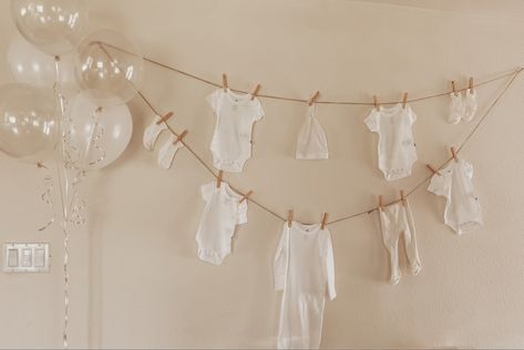 Baby shower laundry theme 🤍 Follow my shop @AngelasLukyBlog on the @shop.LTK app to shop this post and get my exclusive app-only content! #liketkit #LTKstyletip #LTKbaby #LTKbump @shop.ltk https://liketk.it/3BvXh Onesie Baby Shower Garland, Onsie Garland Decoration, Baby Clothes Line Decoration, Baby Onesie Garland, Baby Clothes Garland, Clothesline Baby Shower Decor, Neutral Baby Shower Backdrop, Baby Shower Clothes Line, Baby Shower Clothesline